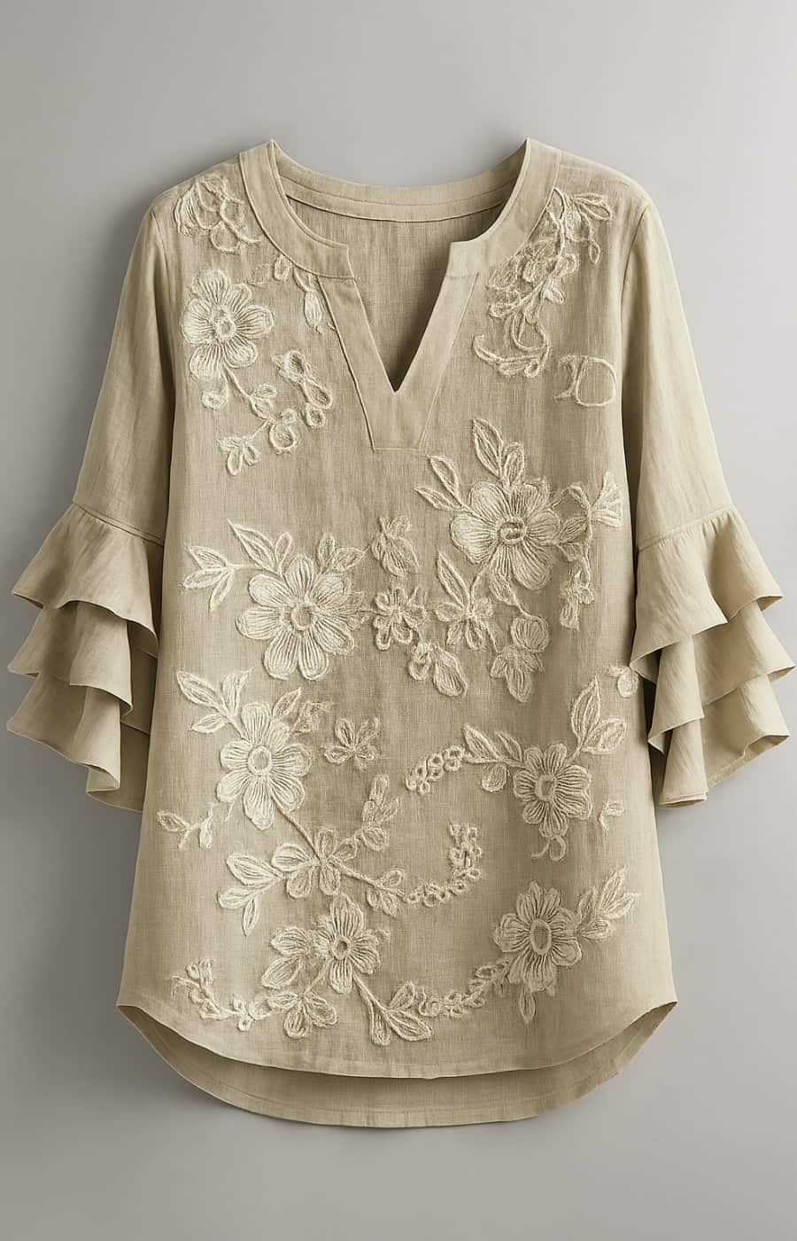 ISABELA | BLUSA HOLGADA CON DETALLES FLORALES Y MANGAS CON VOLANTES