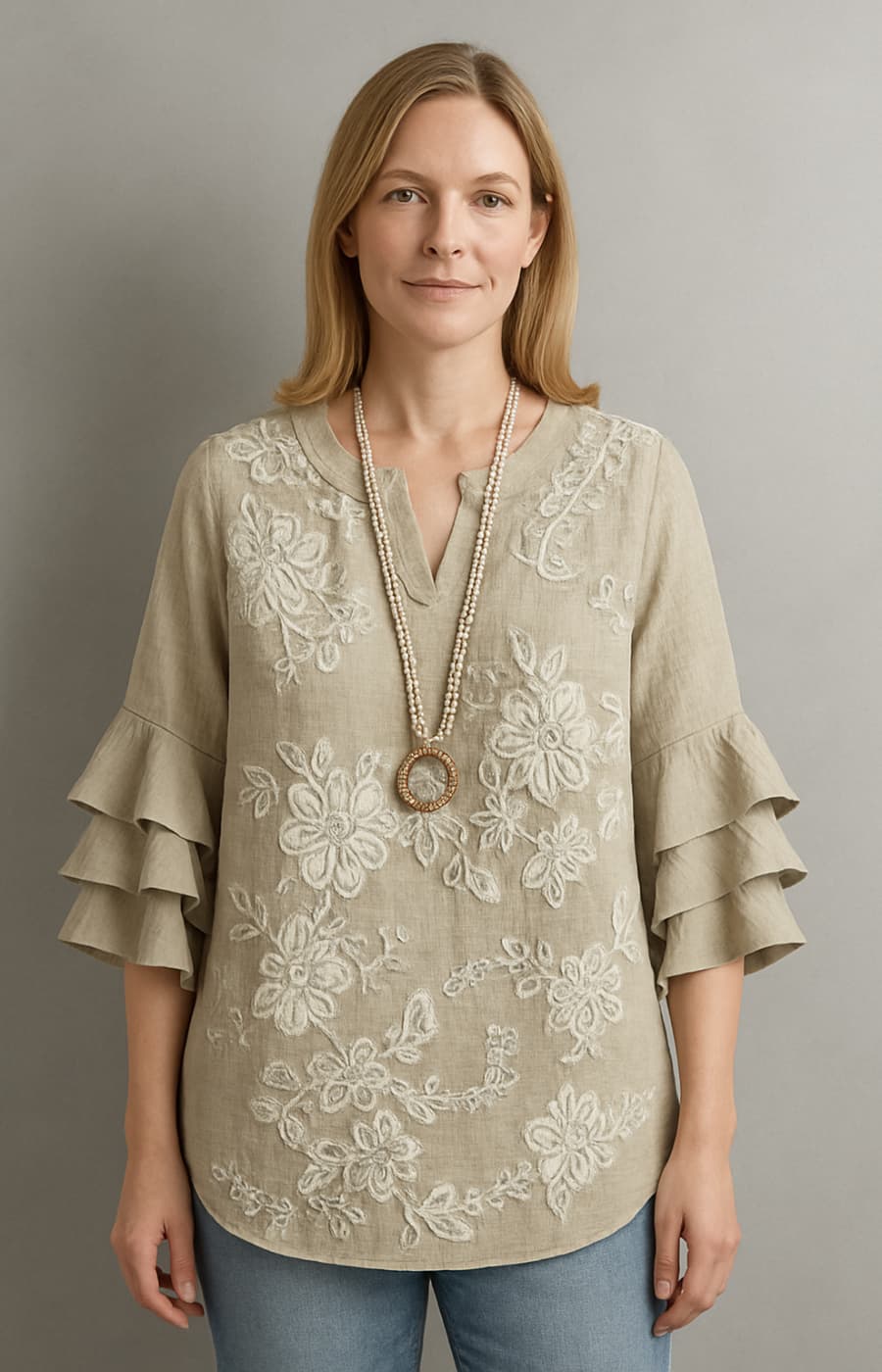 ISABELA | BLUSA HOLGADA CON DETALLES FLORALES Y MANGAS CON VOLANTES